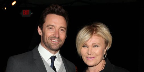 Hugh Jackman and Deborra-Lee Furness attend the DKNY 30th Anniversary fashion show during Mercedes-Benz Fashion Week on Monday, Feb. 10, 2014 in New York. (Photo by Omar Vega/Invision/AP)